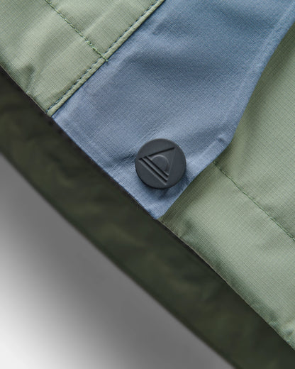 Trailscape Women's Waterproof Jacket - Stormy Blue/Pistachio - Flatlay