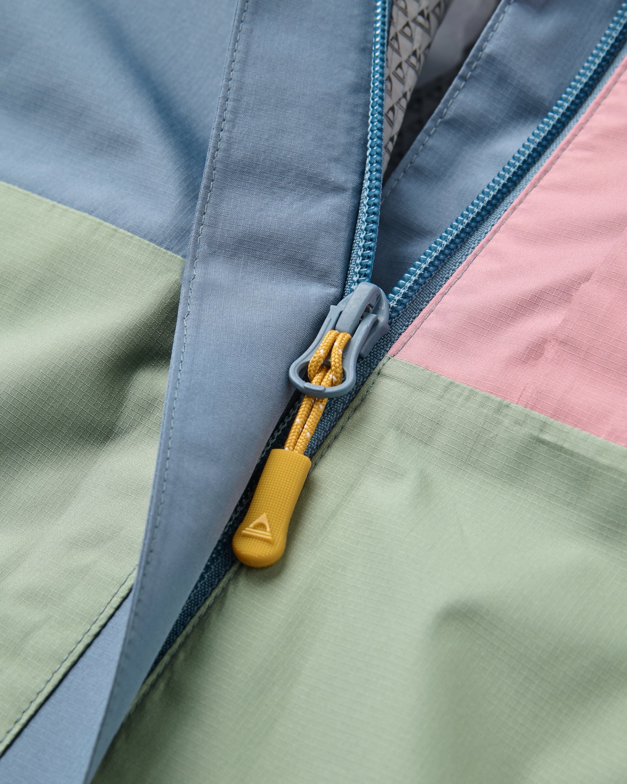 Trailscape Women's Waterproof Jacket - Stormy Blue/Pistachio - Flatlay