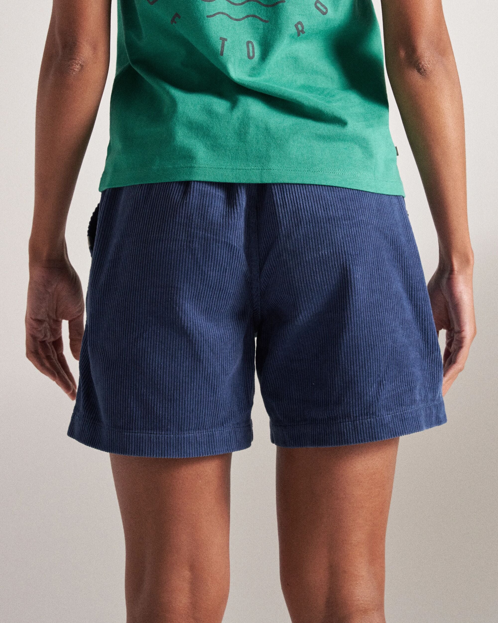 Avian Organic Cord Short - Dark Denim - Studio Model