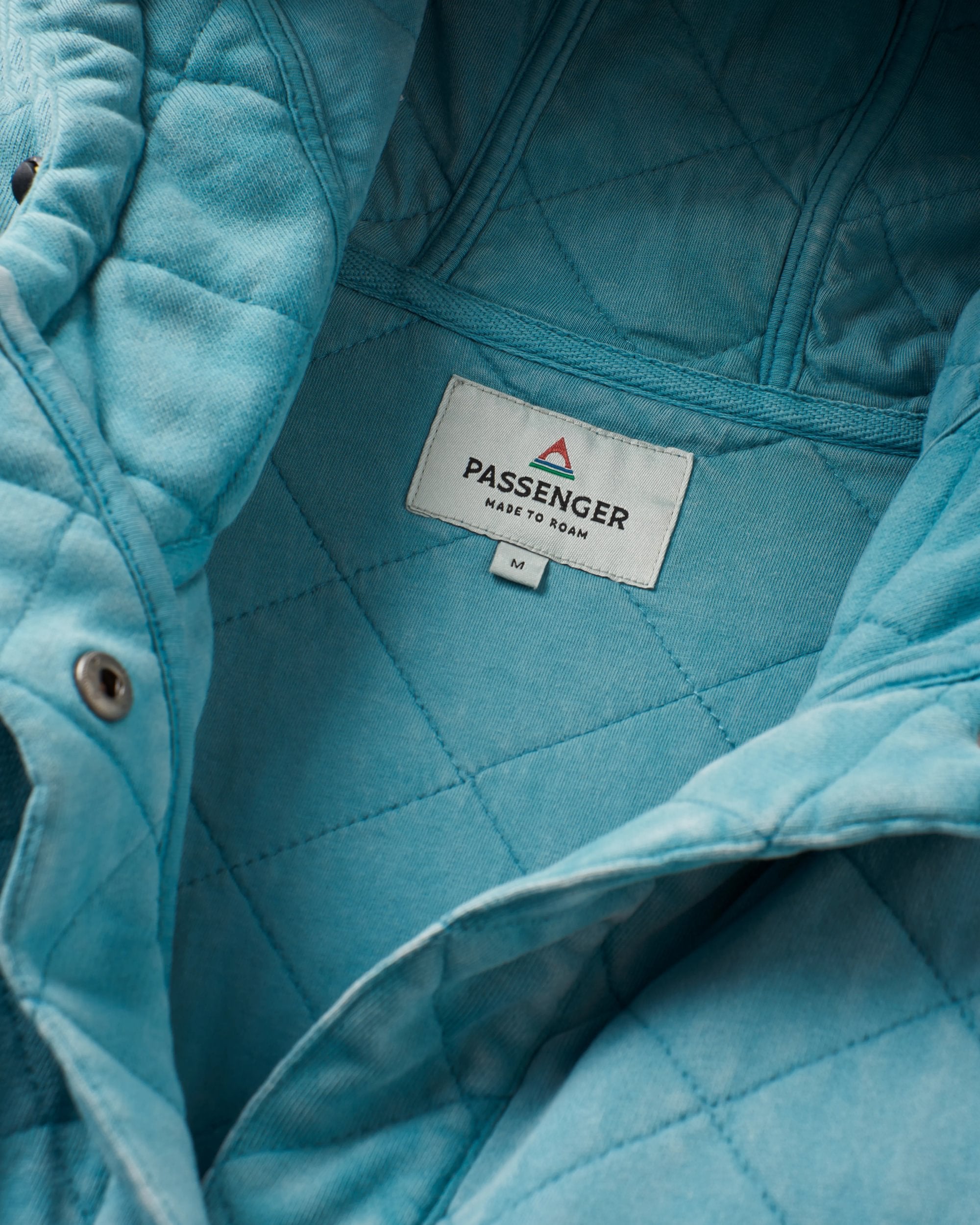 Clementine Recycled Quilted Popper Up Hoodie - Blue Pool - Flatlay