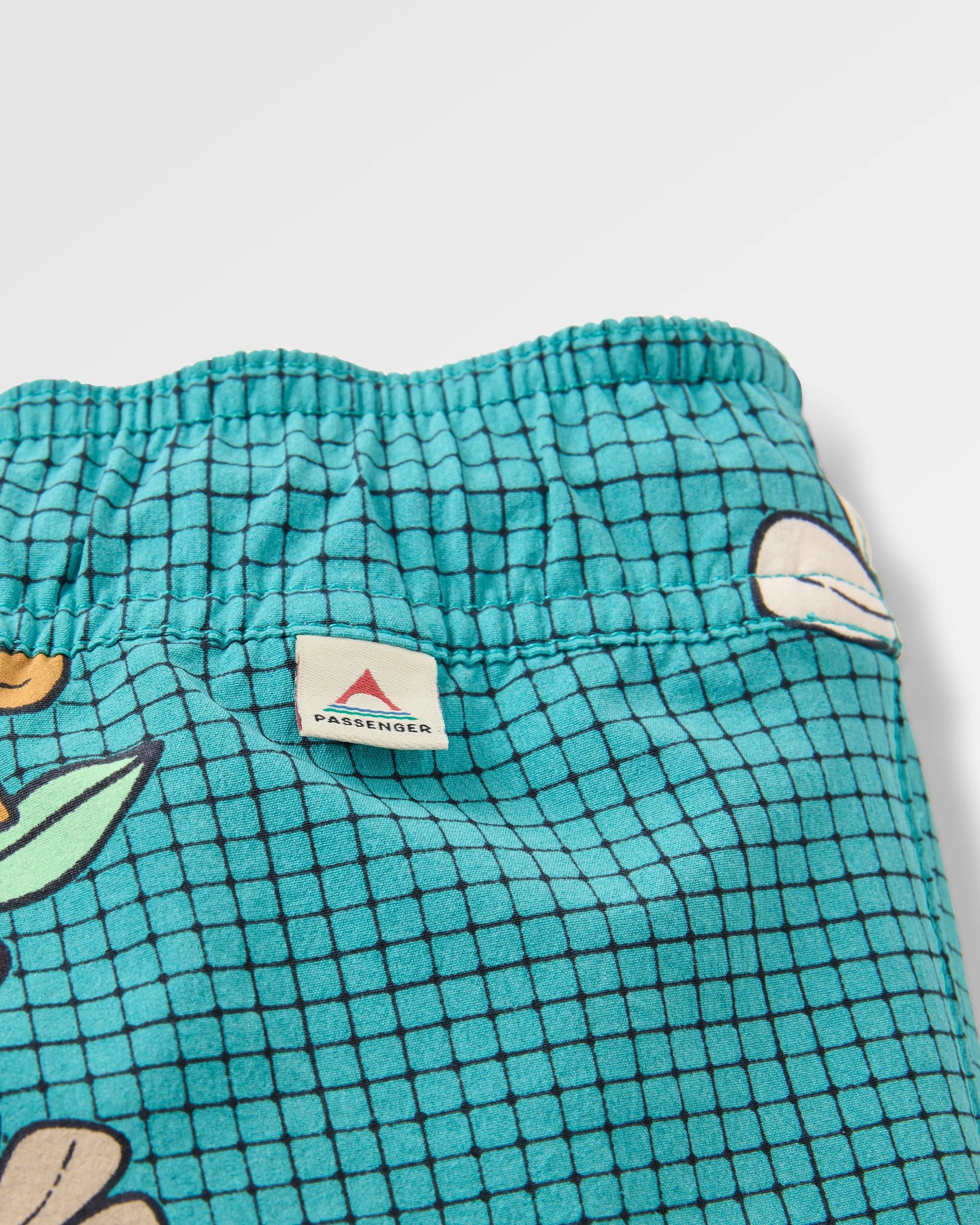 Way Out Netplus® All Purpose Short - Floral Grid Ocean Teal - Flatlay