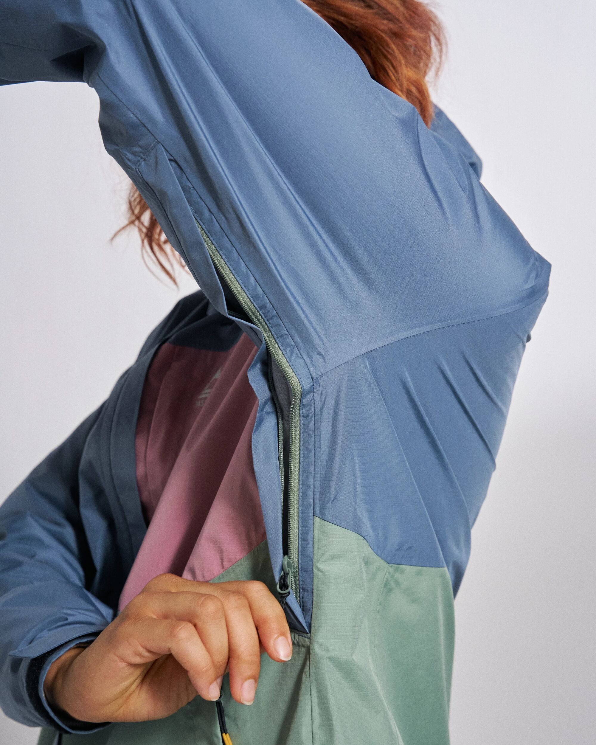 Trailscape Women's Waterproof Jacket - Stormy Blue/Pistachio - Studio Model