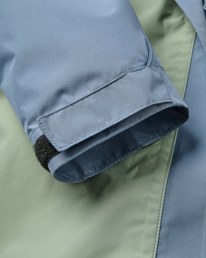 Trailscape Women's Waterproof Jacket - Stormy Blue/Pistachio - Flatlay