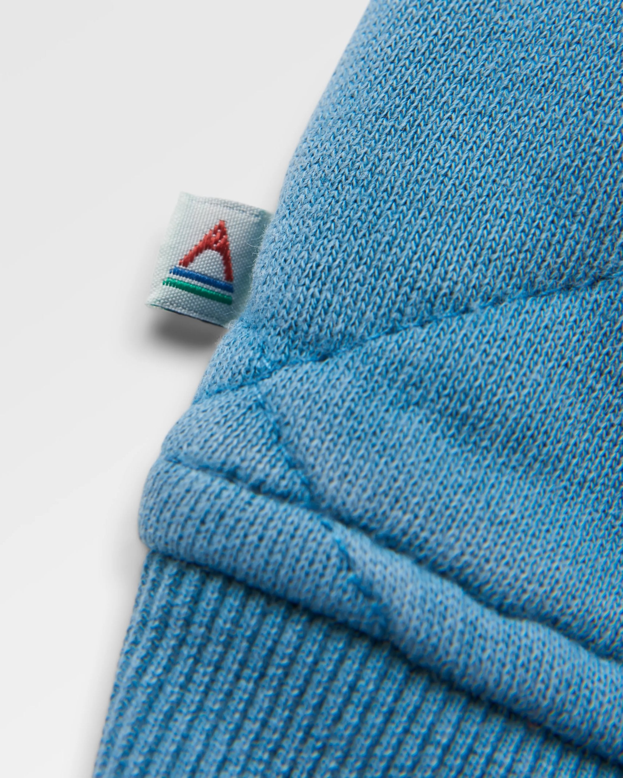 Clementine Recycled Quilted High Neck - Bluejay - Flatlay